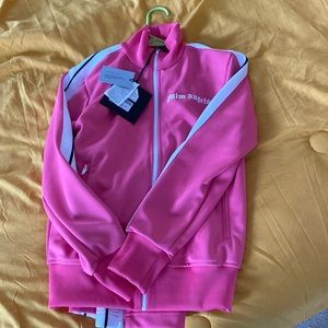 Palm Angel Tracksuit Size ( XS ) . Color Pink . This track suit is BRAND NEW !!